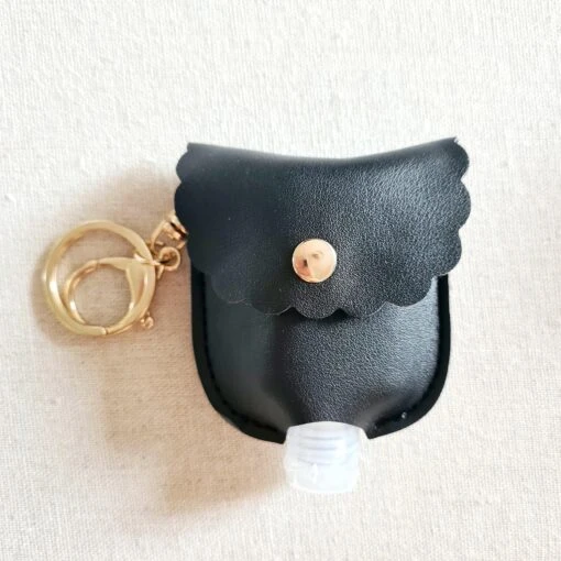 Tragbarer Schlüsselanhänger Für Desinfektionsgel Smooth -Mode Dessous Geschäft llavero portatil para gel desinfectante liso pasarelle negro 372059 scaled