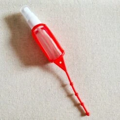 Tragbarer Schlüsselanhänger Für Desinfektionsgel -Mode Dessous Geschäft llavero portatil para gel desinfectante pasarelle rojo 337630